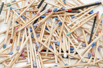 matches with many colours head screw lying in layer the whole frame