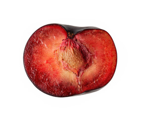 Half of ugly organic misshapen black plum with stone isolated on white background. Red pulp plum....