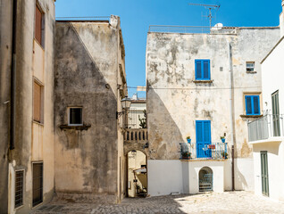 Fototapeta premium A picturesque square near the Byzantine Church of St. Peter’s in Otranto city center, Salento, Puglia region, Southern Italy