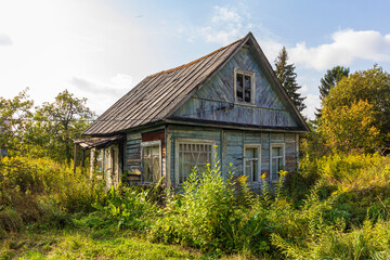 Typical architecture dacha. seasonal, year-round second home in exurbs. Village summer houses in forest. Poor Soviet housing. Electricity supply, electric wire.