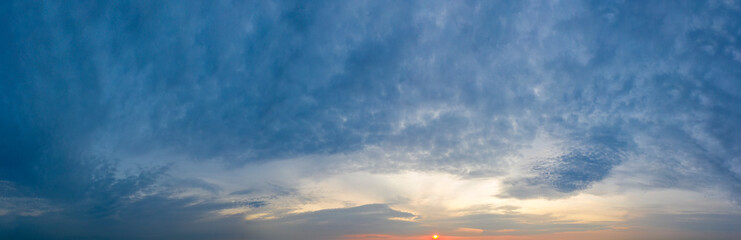 Naklejka na ściany i meble The sky above the clouds before dawn. Wonderful heavenly landscape.