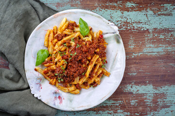 Traditional casarecce al bronzo al rag italian pasta with minced meat tomato ragu sauce served as...