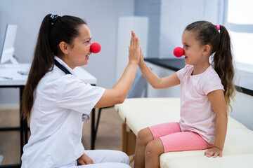 Kid And Pediatric Doctor High Five