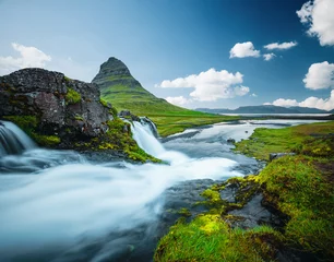 Foto auf Acrylglas Kirkjufell Captivating view of the Kirkjufell volcano. Kirkjufellsfoss waterfall, Iceland, Europe.