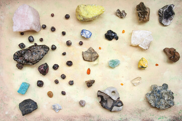Set of natural minerals on a light background. Top view.