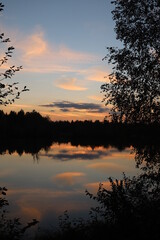 Obraz na płótnie Canvas Sunset at lake