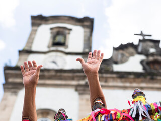 Faithful celebrate the last Friday of the year at Senhor do Bonfim Church. Salvador, Bahia, Brazil.