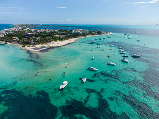yachts parked in Playa Norte beach the most popular beach in Mexico. located at Isla Mujeres near...