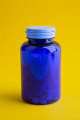 Pills in a blue Pillbox