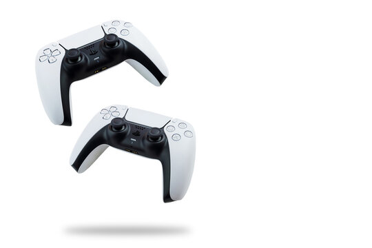 Playstation 5 Dual Sense Controllers falling on white background. Rio de Janeiro, RJ, Brazil. September 2021.