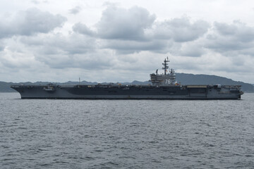 United States Navy aircraft carrier USS Ronald Reagan sailing in Tokyo Bay.