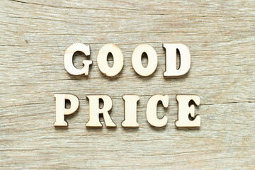 Alphabet letter in word good price on wood background