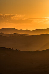 sunset over the hills