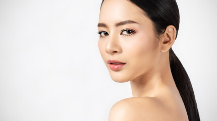 Closeup portrait of beauty asian woman with fair perfect healthy glow skin half face with copy...