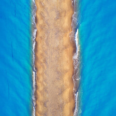 Empty tropical beach, and clear blue water. aerial view.