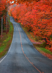 scenic autumn byway in Black river national forest of Michigan upper peninsula