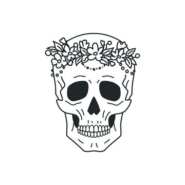 Contour image of a human skull decorated with a wreath of wildflowers.