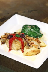 Codfish behind the hills, a classic in Portuguese cuisine