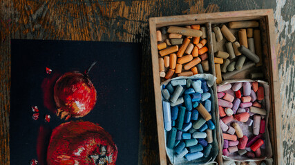 Obraz premium Art studio at home. Colorful pastel chalks. Artist supplies and accessories