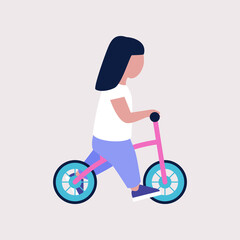 Obraz premium Little girl on a balance bike