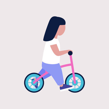Little girl on a balance bike