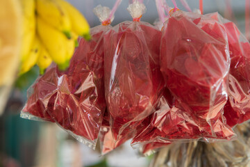 Raw redfish crackers hanging at the stall.