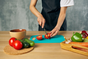 Cook in black apron Cooking healthy eating salad diet