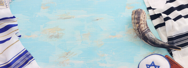 religion image of shofar (horn) on white prayer talit. Rosh hashanah (jewish New Year holiday),...