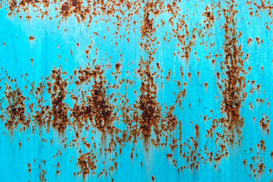 Blue pained rusted metal background