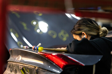 Woman fixing car - obrazy, fototapety, plakaty