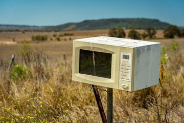Old microwave oven used as a mailbox in rural Australia