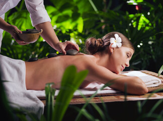 Obraz premium portrait of young beautiful woman in spa environment