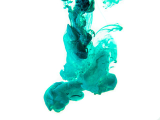 turquoise paint dissolves in water on a white background like a cloud or smoke