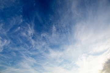 Blue sky abstract background white fluffy clouds