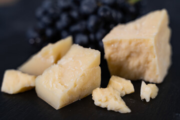 delicatessen cheese with grapes, top view. Close-up