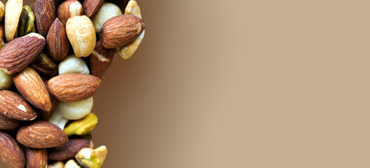 Mixed Healthy Nuts on Background with Copy Space