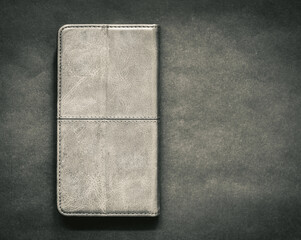 wallet or gadget in a leather case, black-white