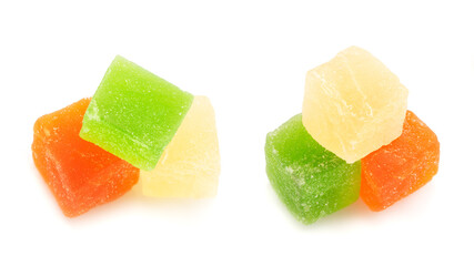 Pile of multi-colored pineapple sweets isolated on white