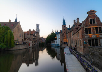 Fototapeta na wymiar CITY AND ITS BUILDINGS AND CANALS AT SUNSET