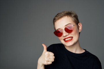 short haired woman hand gesture Red lips glamor close-up