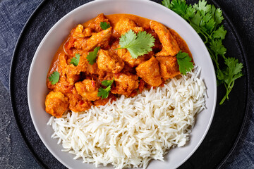 butter chicken, curry of spicy chicken with rice