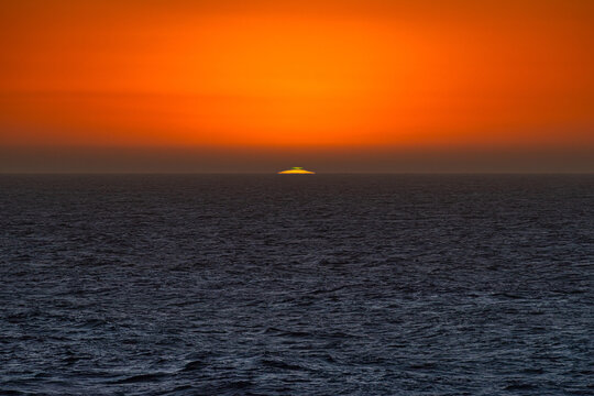 Green flash sunset at sea
