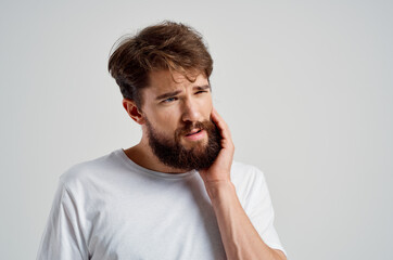 Fototapeta premium emotional man medicine toothache and health problems isolated background