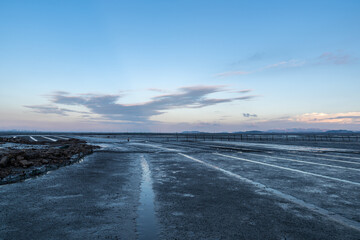 The  shoal  at dusk, light yellow light and black land