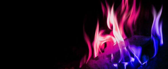 The texture of the flame on a black background. The ultraviolet glow of the fire. 3d illustration