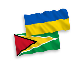Flags of Co-operative Republic of Guyana and Ukraine on a white background