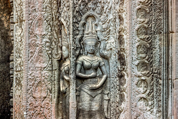 Fototapeta na wymiar detail stone carving at Ta Prohm temple in Angkor Wat, Cambodia 