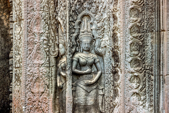 detail stone carving at Ta Prohm temple in Angkor Wat, Cambodia 
