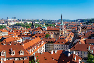 Fototapeta na wymiar Red roofs and spires of Lesser Town in Prague. Czech Republic