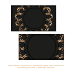 Fototapeta premium Business card template in black with brown mandala pattern